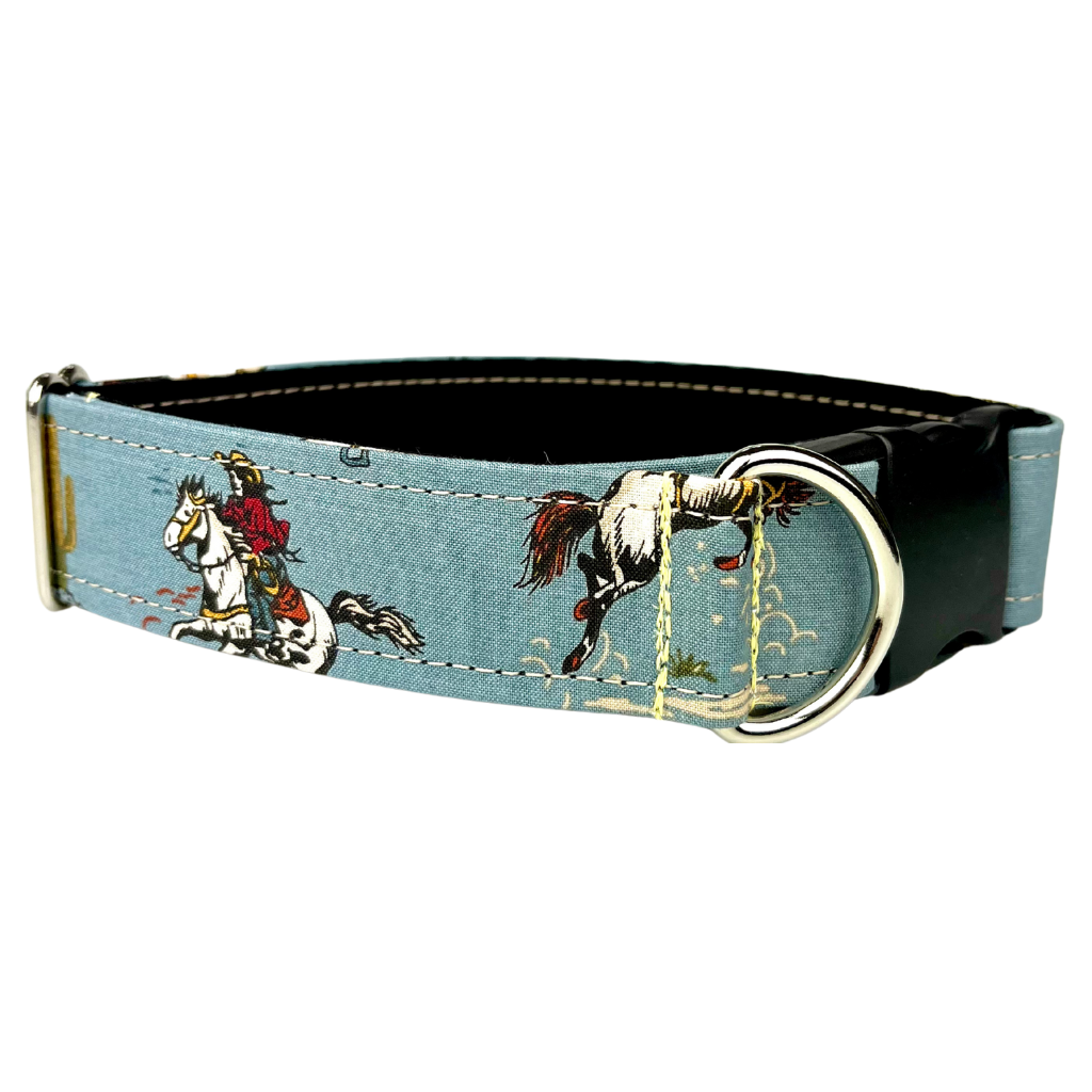 Western Dog collar with horse design and cowboy  on a light blue print by SLiK Hound against a white background