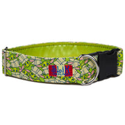 Bright lime green and tan baby Yoda cartoon design dog collar with shiny metal d ring  and black buckle. White background.