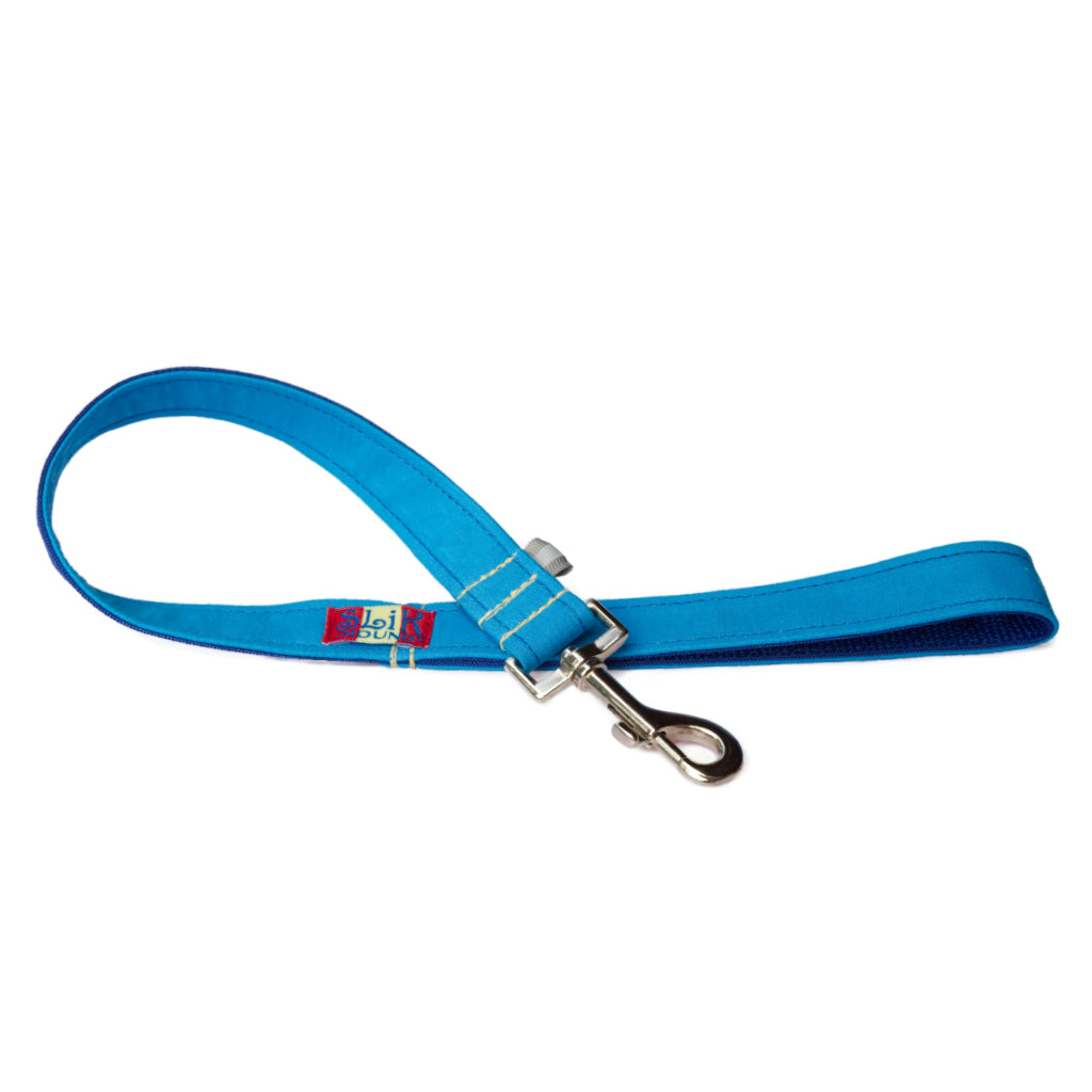 Bright sky blue 2ft traffic leash for dogs by SLiK Hound. With yellow kevlar stitching, silver quick release metal snap hook, and reflective tabs. Pictured against a white background.